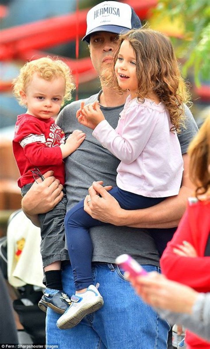 Doting dad Vince Vaughn enjoys a family day at Disneyland Vince
