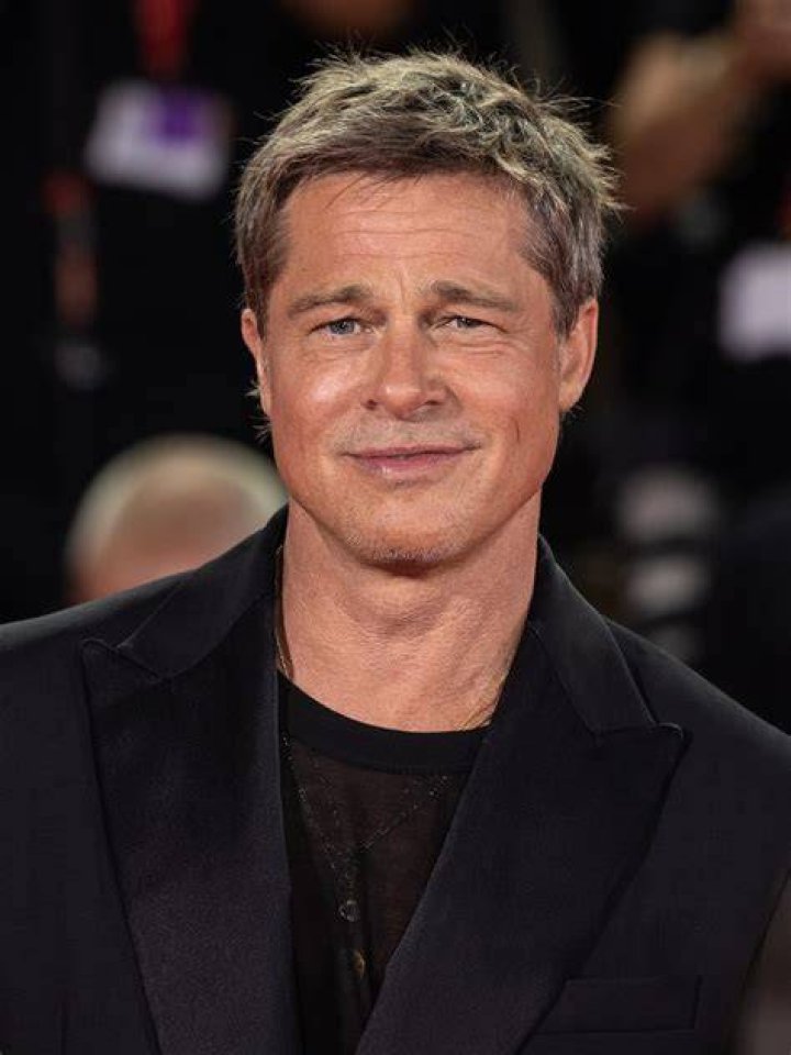 File photo of Brad Pitt and wife Jennifer Aniston arriving at the Emmy