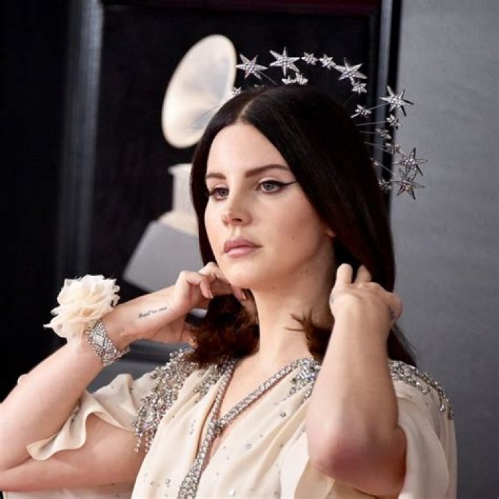 Lana Del Rey Makes GRAMMYs Red Carpet Debut With Boyfriend Sean Larkin