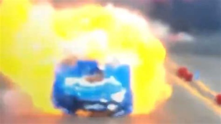 Shocking moment car explodes at 306mph during NHRA Funny Car race